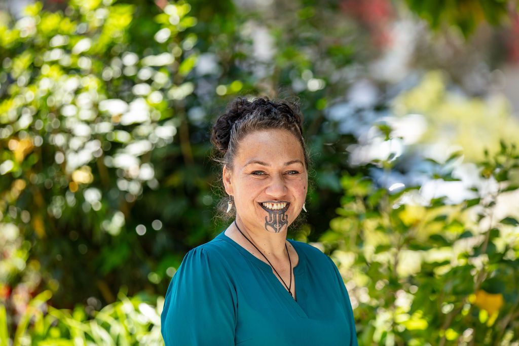 Claire House Photograph business headshot photograph of smiling woman.