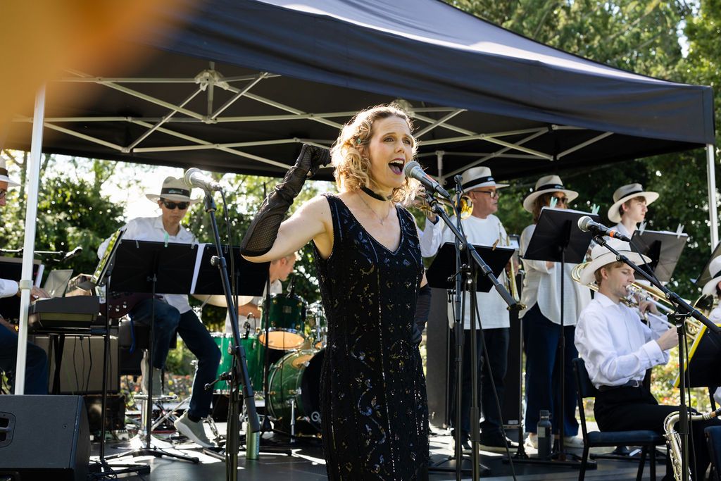 Claire House Photography event photograph of singer and jazz band.