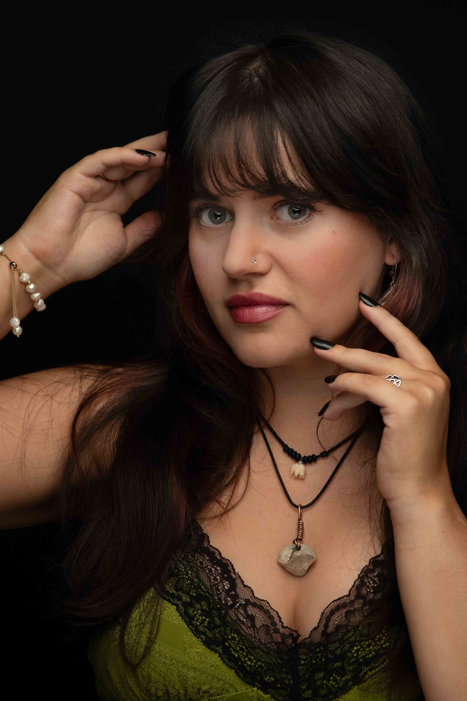 Portrait shot of young woman with green dress