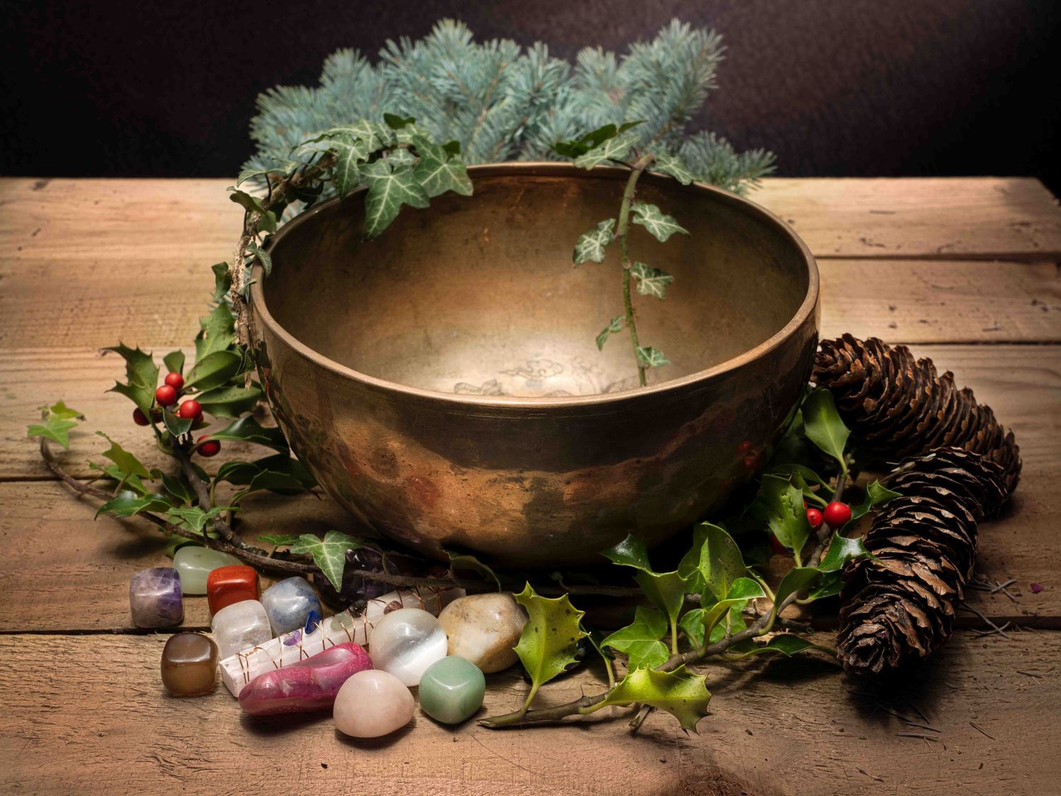 Creative image of a witches alter with singing bowl and crystals