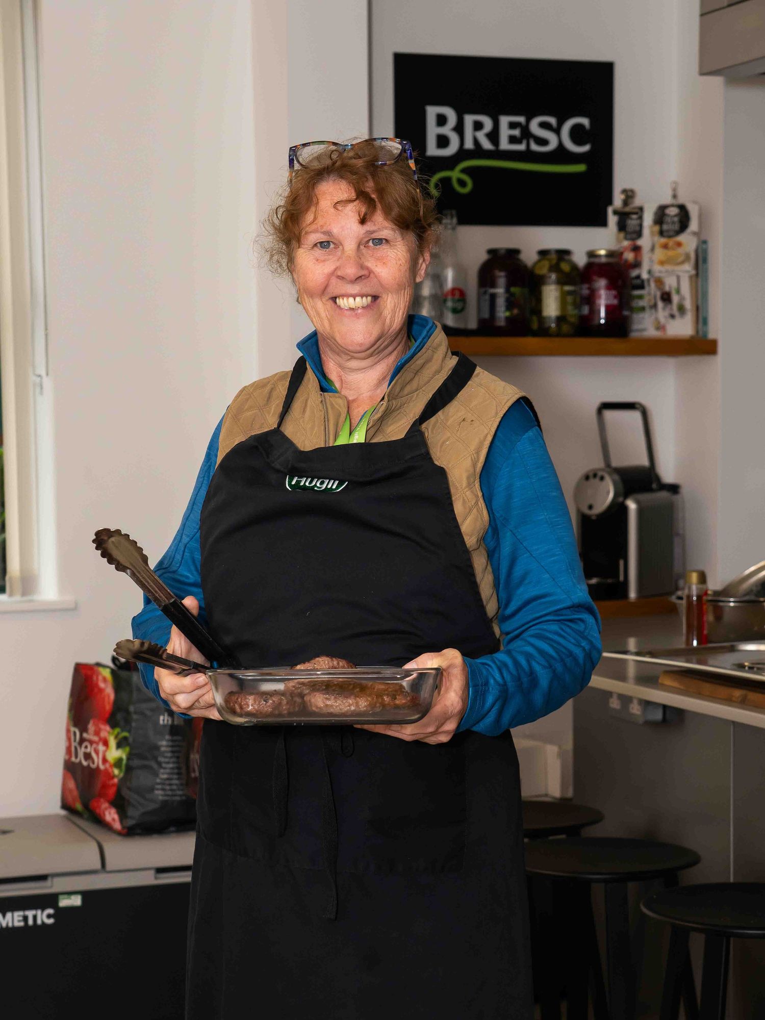 Woman holding tray of food