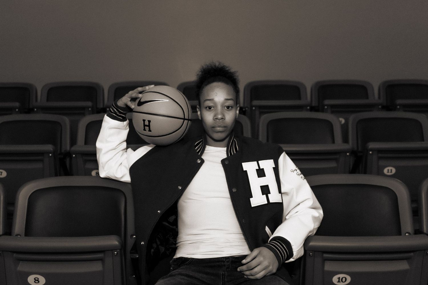 dramatic high-contrast media day for women's basketball recruit.