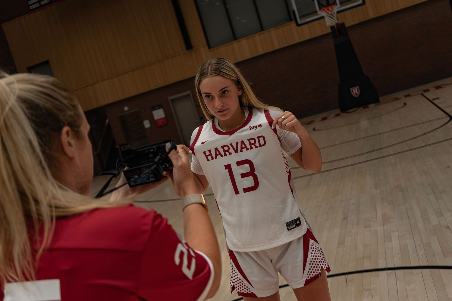 dramatic high-contrast media day for women's basketball recruit.