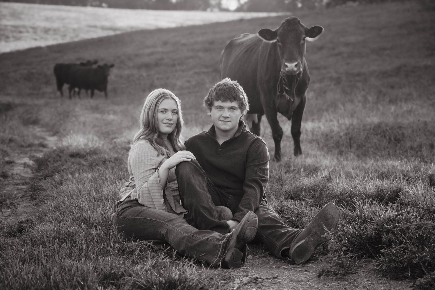 Black-and-white close-up portrait of a couple together.