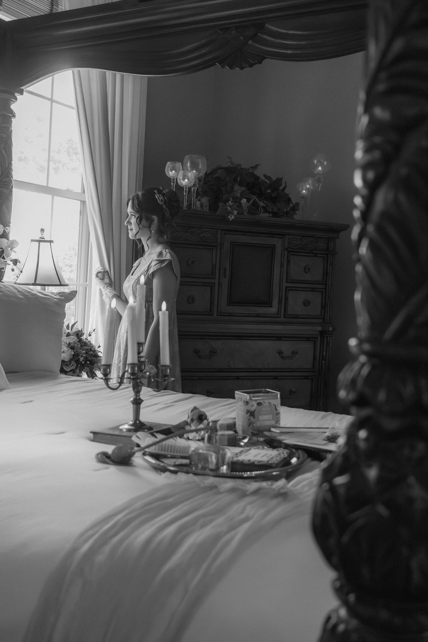 Black-and-white wedding detail photo inside the bridal getting-ready room.