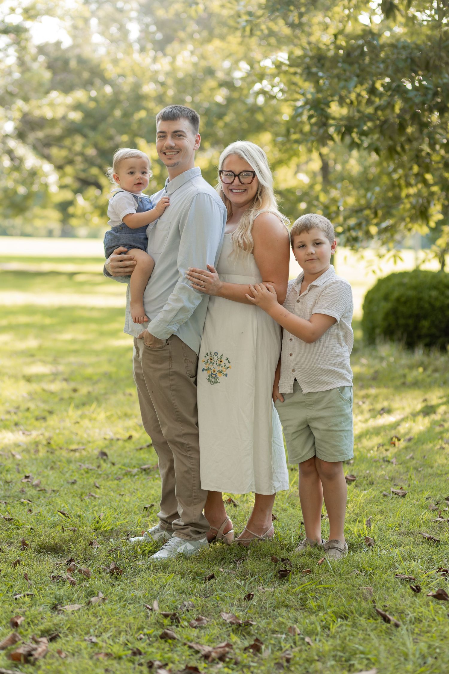 Anna Mae & Co. founder Kaitlyn Paige with her fiancé and their two sons during a family portrait session.