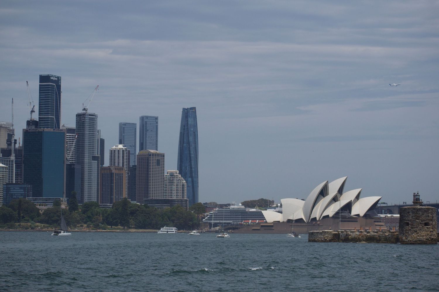 Capturing the Sydney Opera House with the city standing tall behind her.