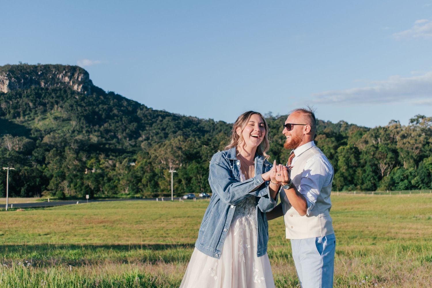 Candid photograph of the bride and groom enjoying their incredible day.