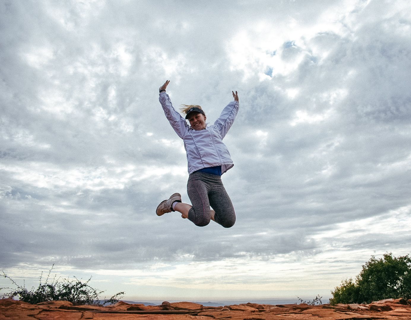 Candid picture of celebrating after a difficult hike.