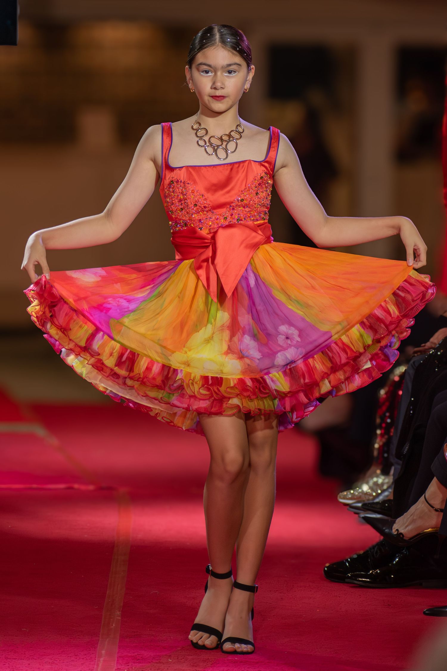 Detailed photograph of a designer gown during a runway presentation in Brisbane.