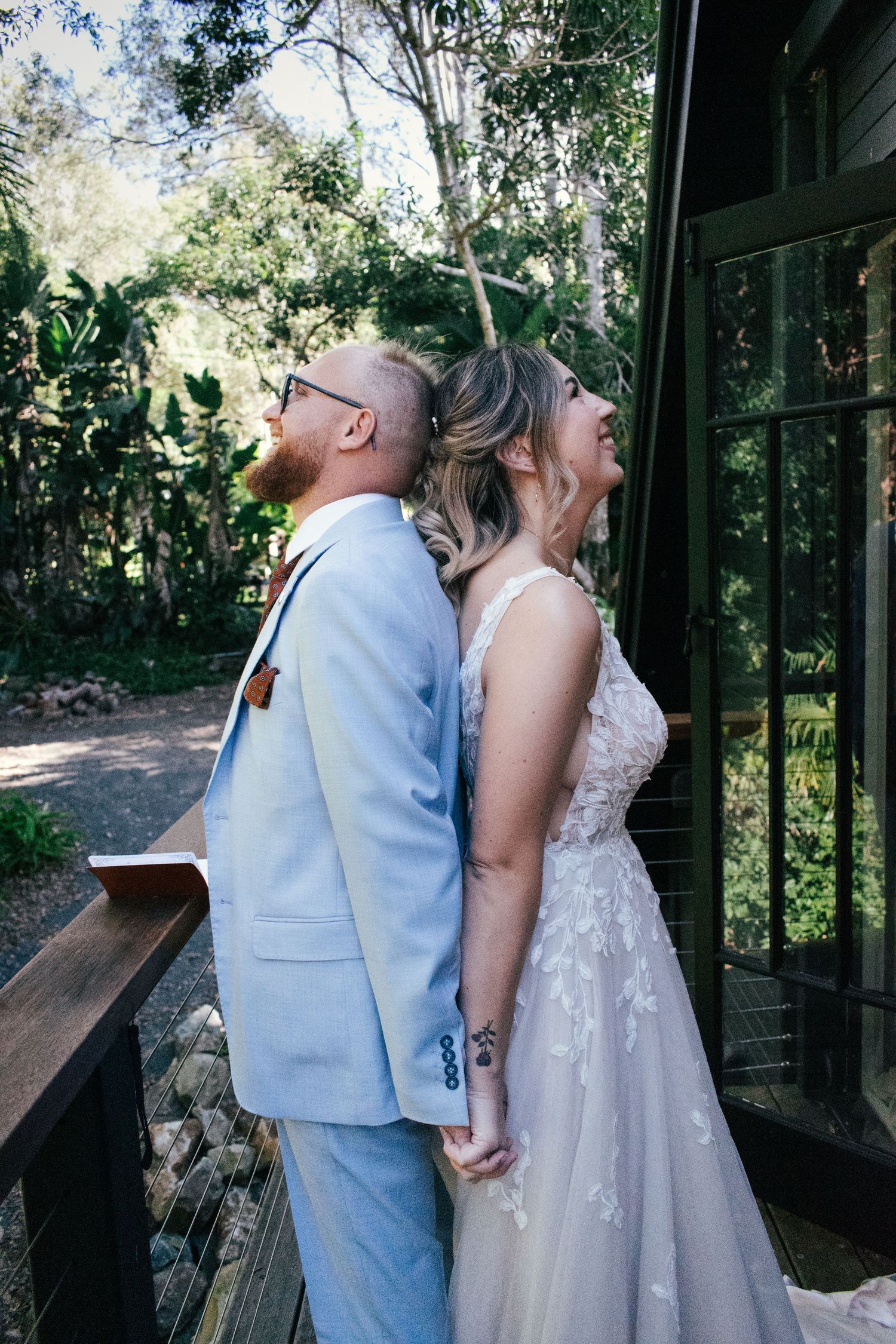 Emotional first touch and sharing of vows captured on their wedding day.