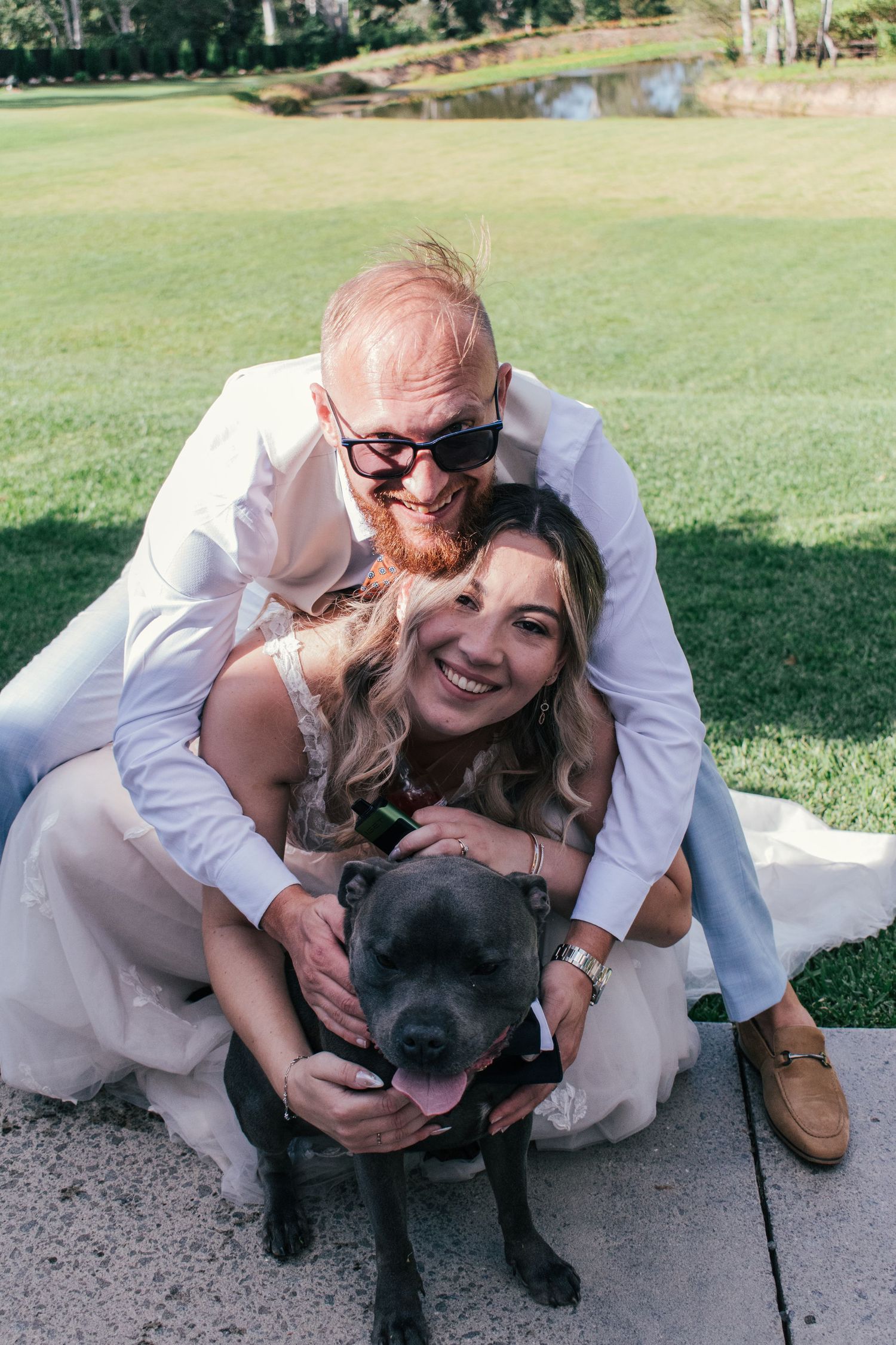 Bride and groom celebrating with their fur baby in Brisbane.