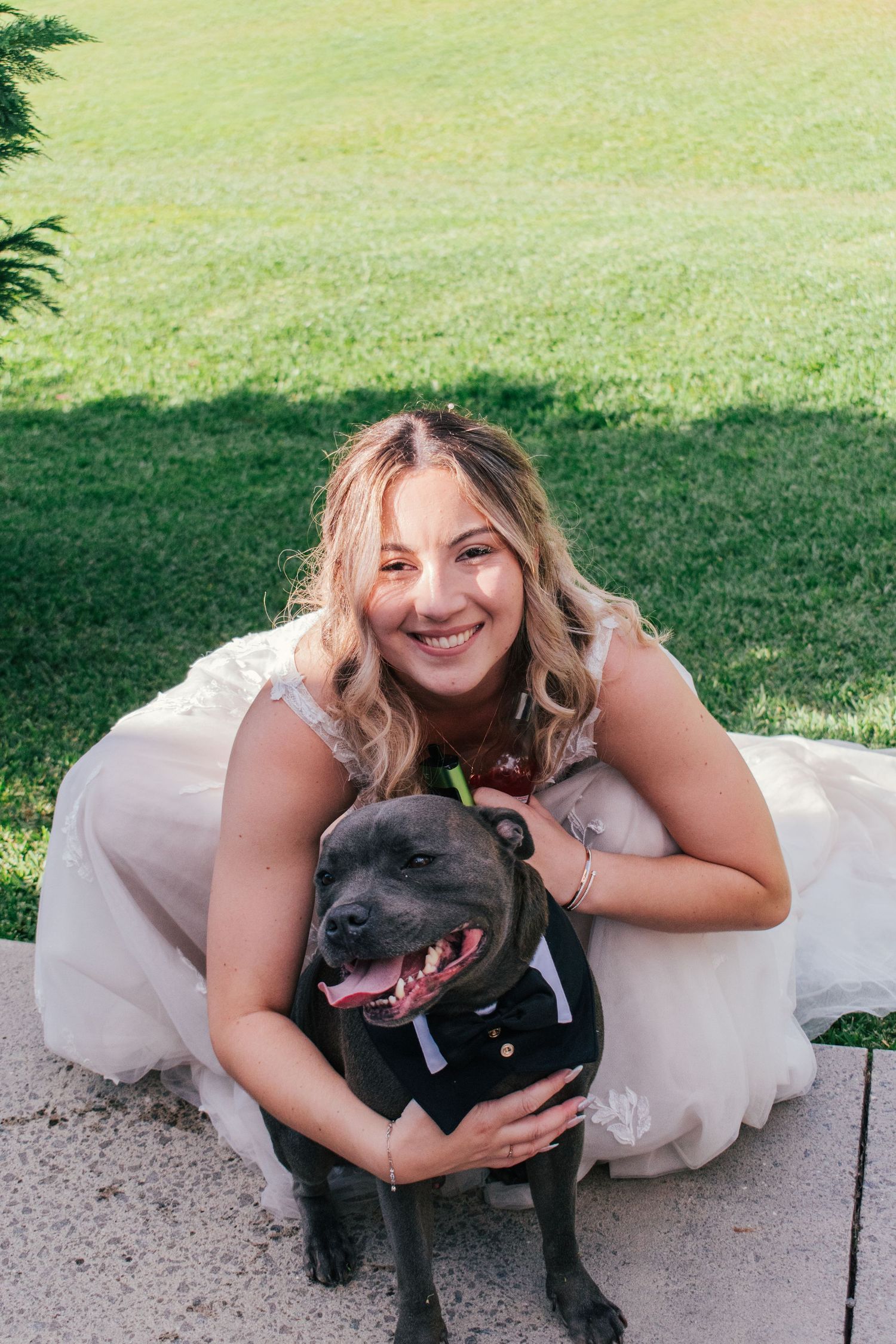 Candid photo of the bride with her fur baby at her wedding in Brisbane.