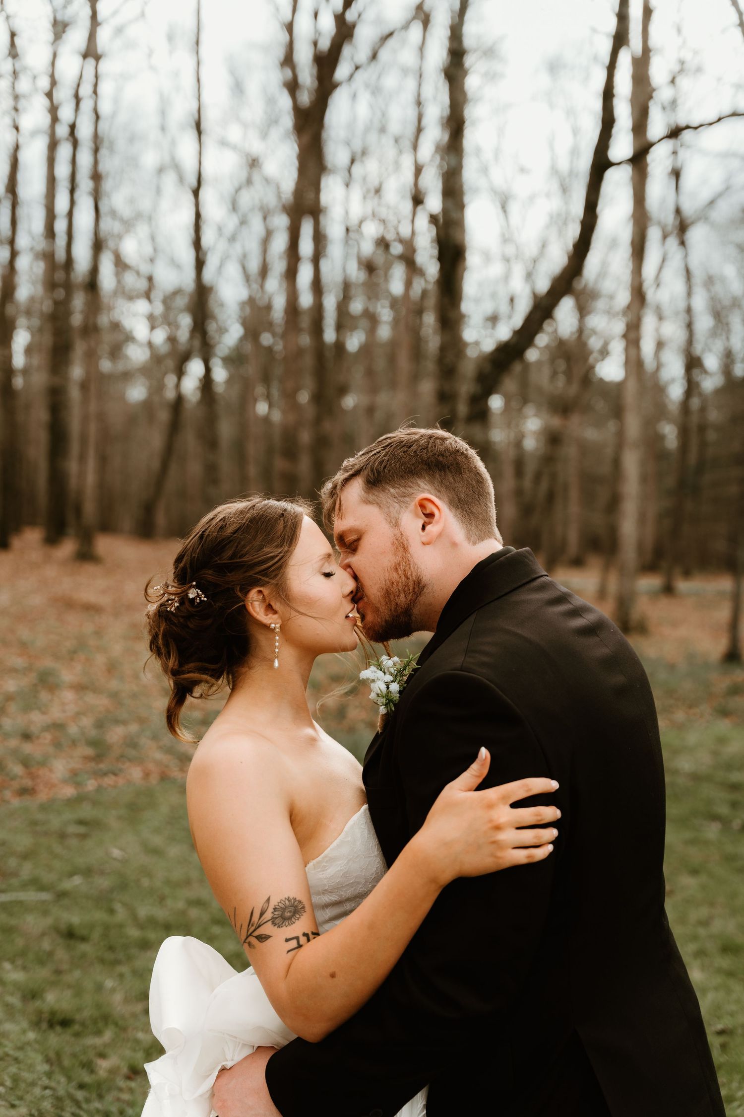 bride and groom embracing a emotional kiss