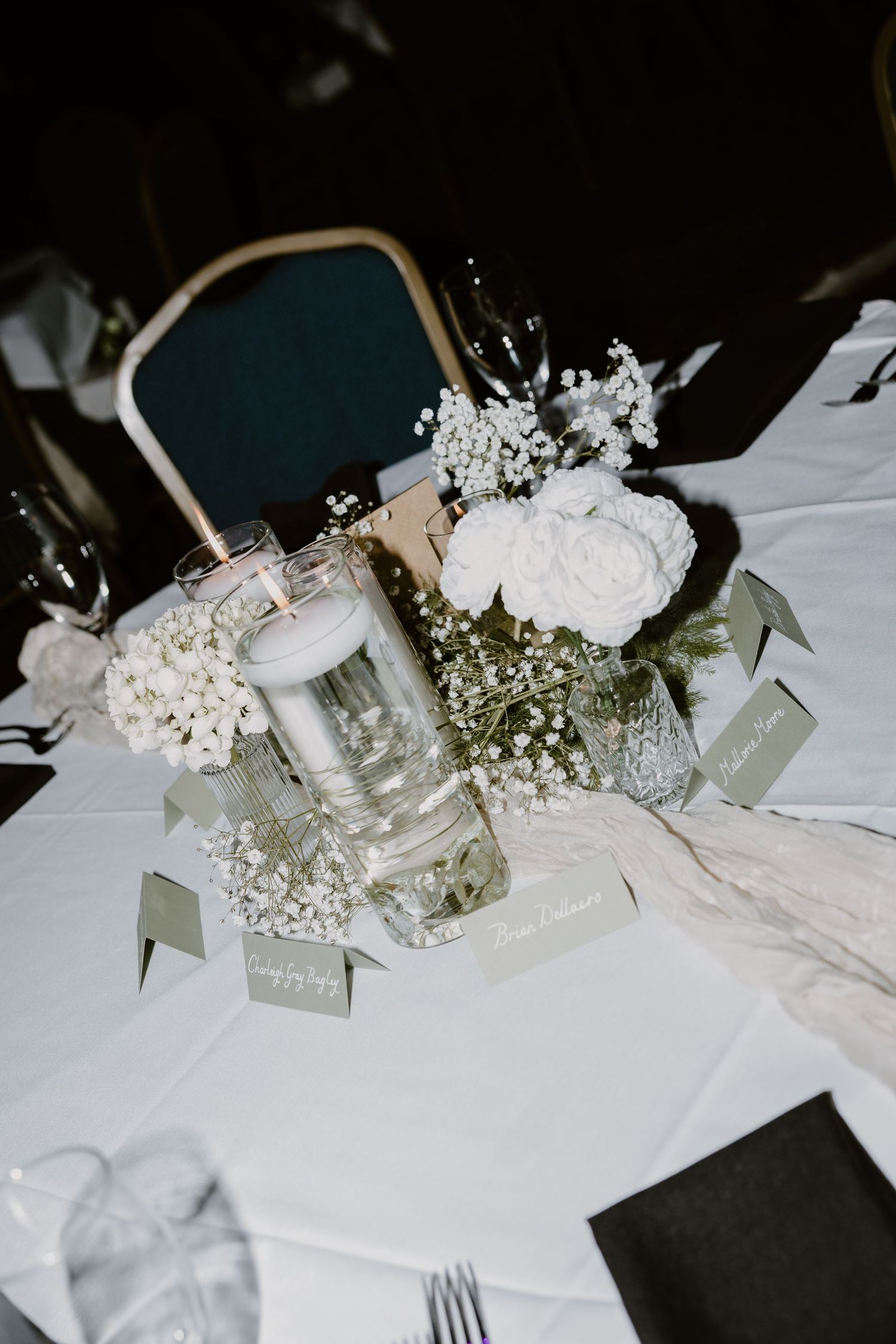 wedding table scape with white flowers and candles
