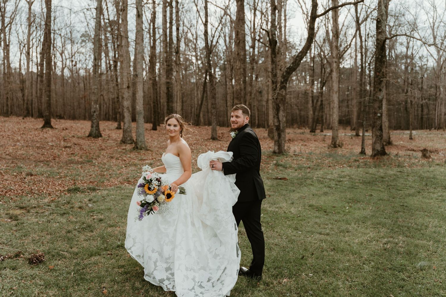bride and groom running away