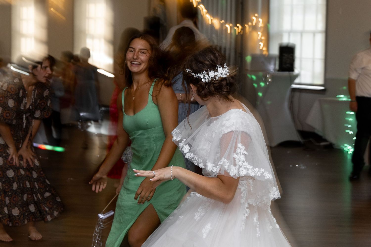 Artistic wedding portrait of a bride and guest after a Catholic Wedding in Minneapolis Minnesota