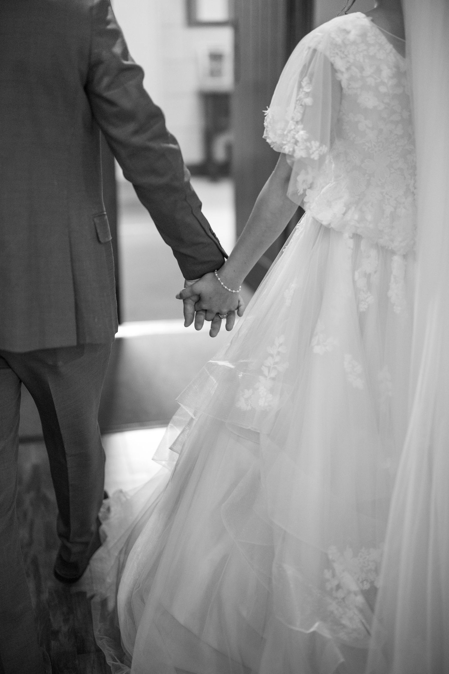 Black and White portrait of a newlywed couple after their Catholic Wedding in a Catholic Church in Minneapolis Minnesota