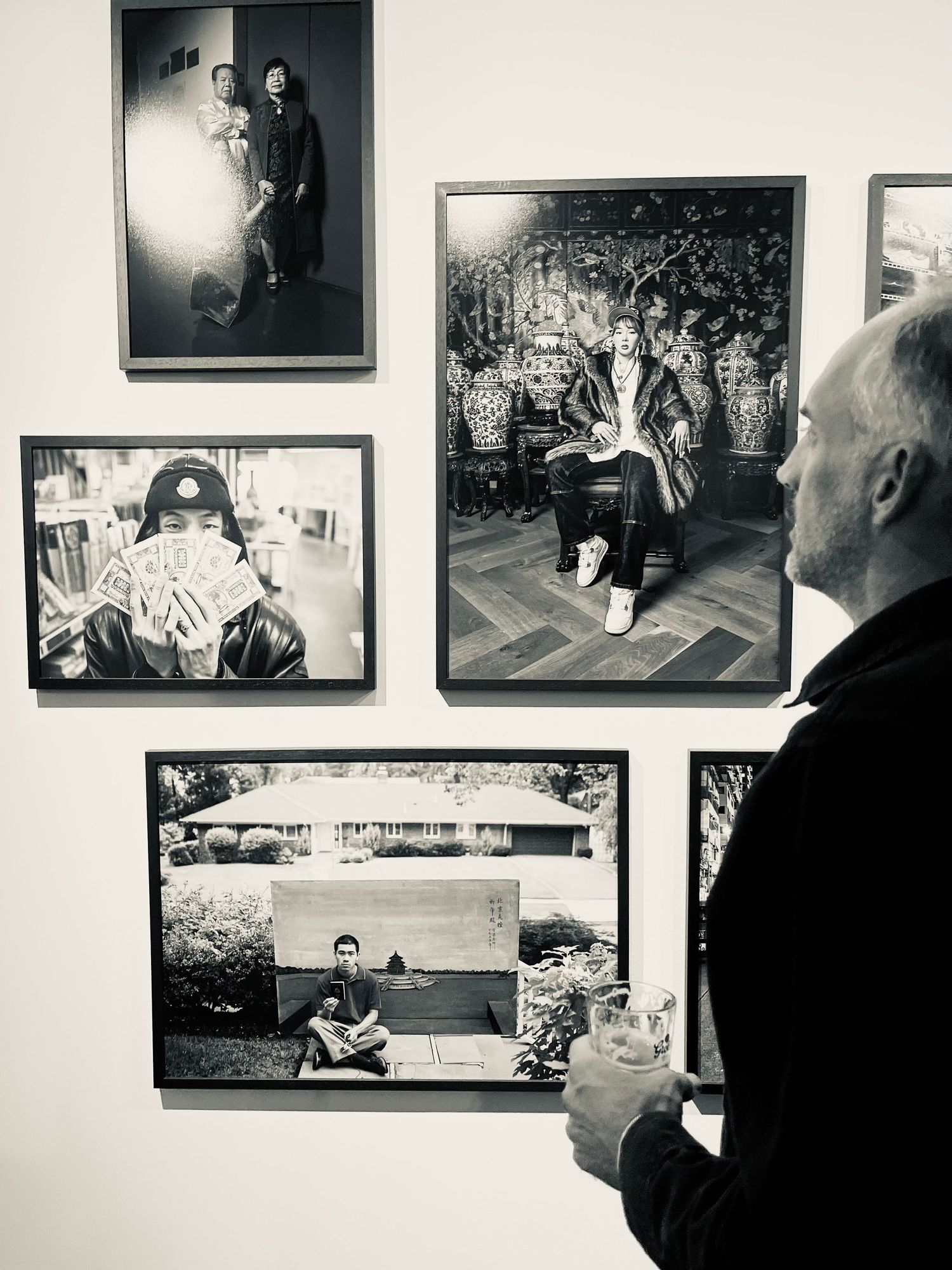Guests visiting exhibition gallery, professional photography documenting authentic moments