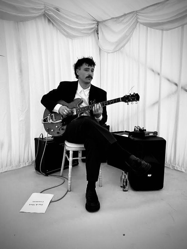 Guest interacting with music at an intimate private event, authentic and soulful imagery
