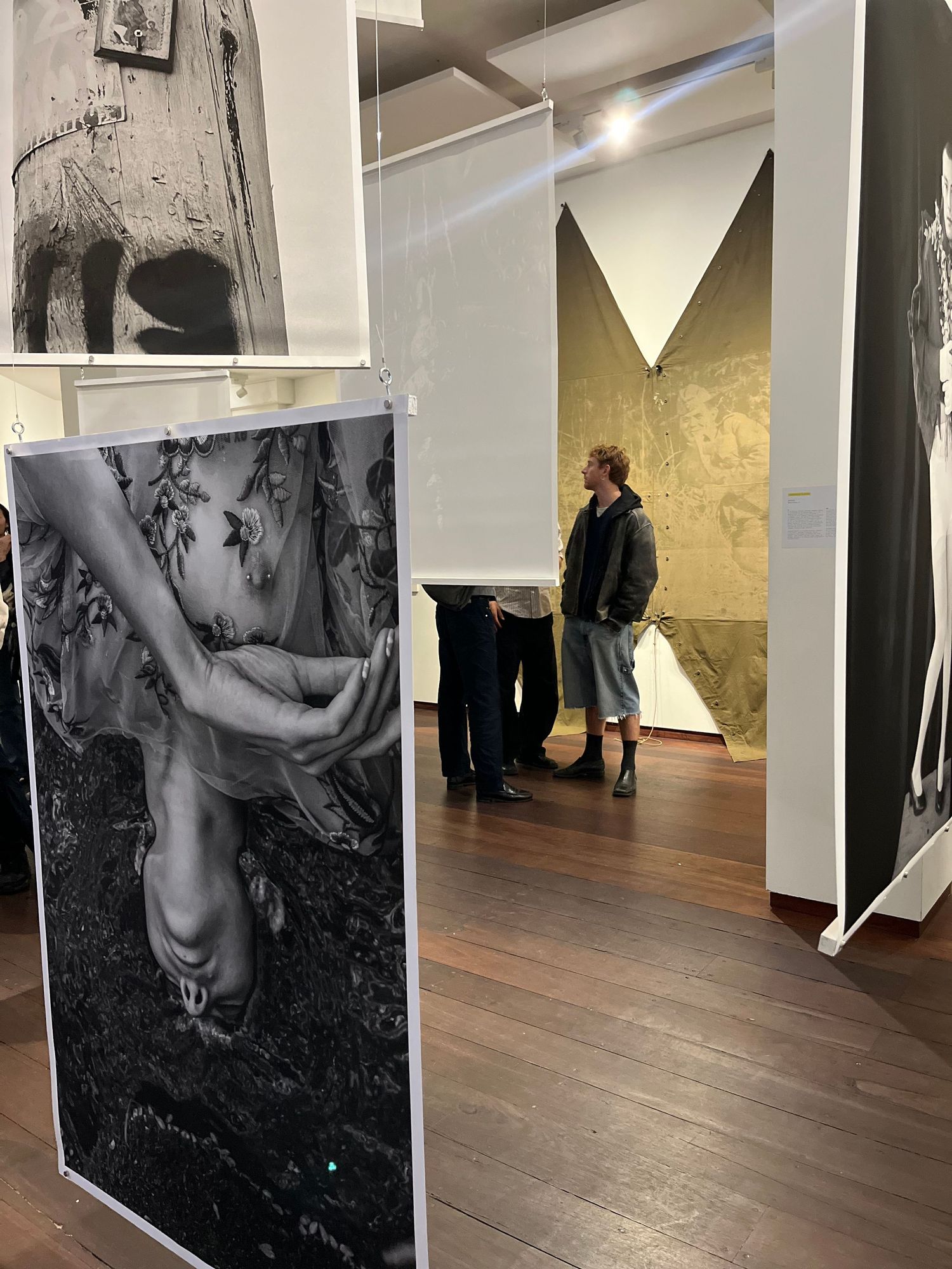 Gallery photography opening capturing creators at work, authentic photograph visuals for brand storytelling
