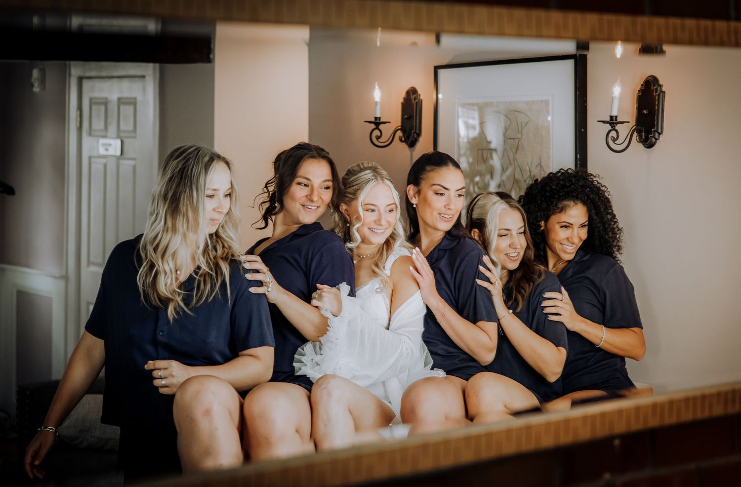 Wedding party members share emotional embraces during pre-ceremony preparations.Editorial and Cinematic Wedding photos