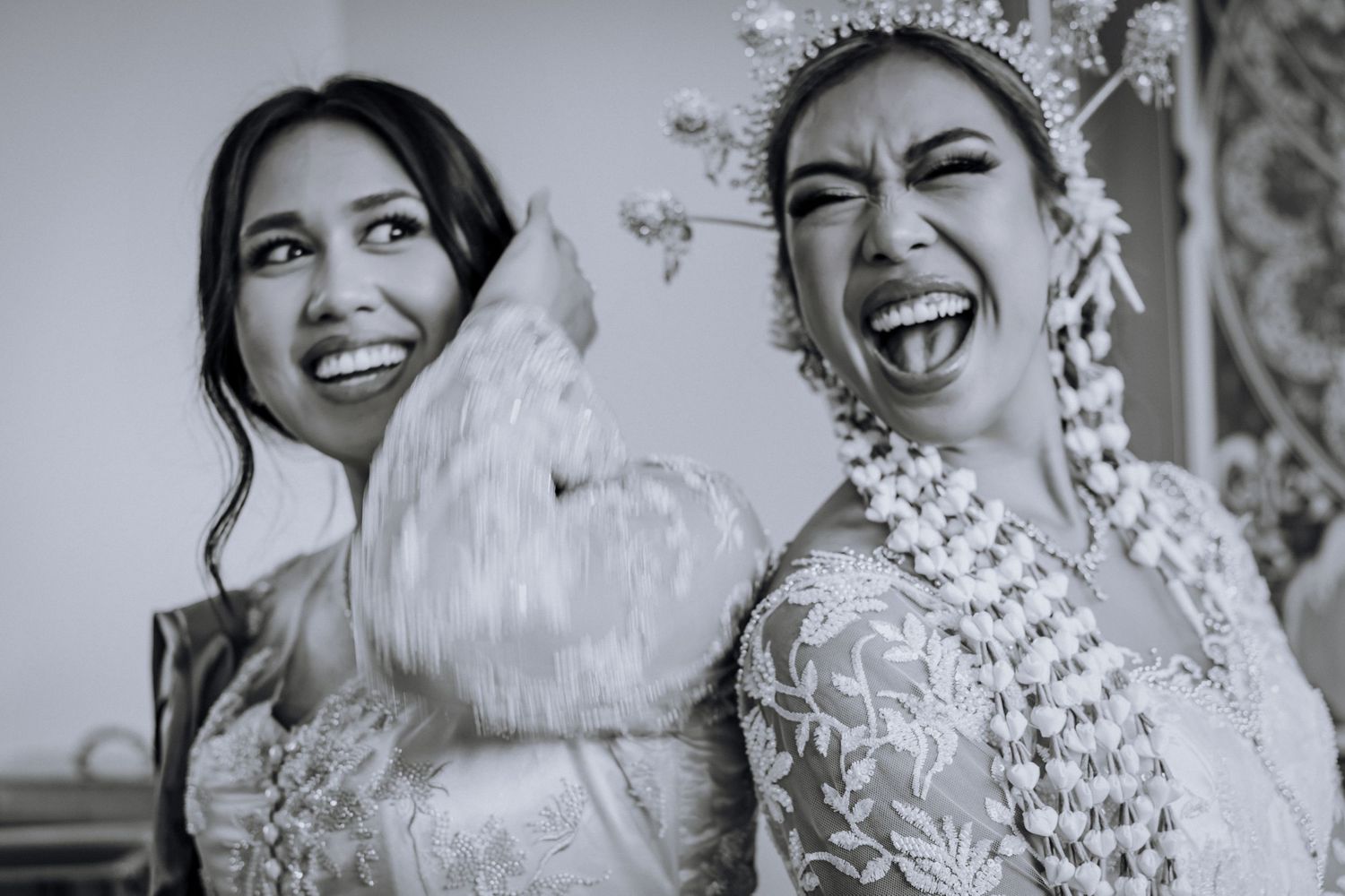 A series of joyful wedding celebration moments captured in black and white photography.