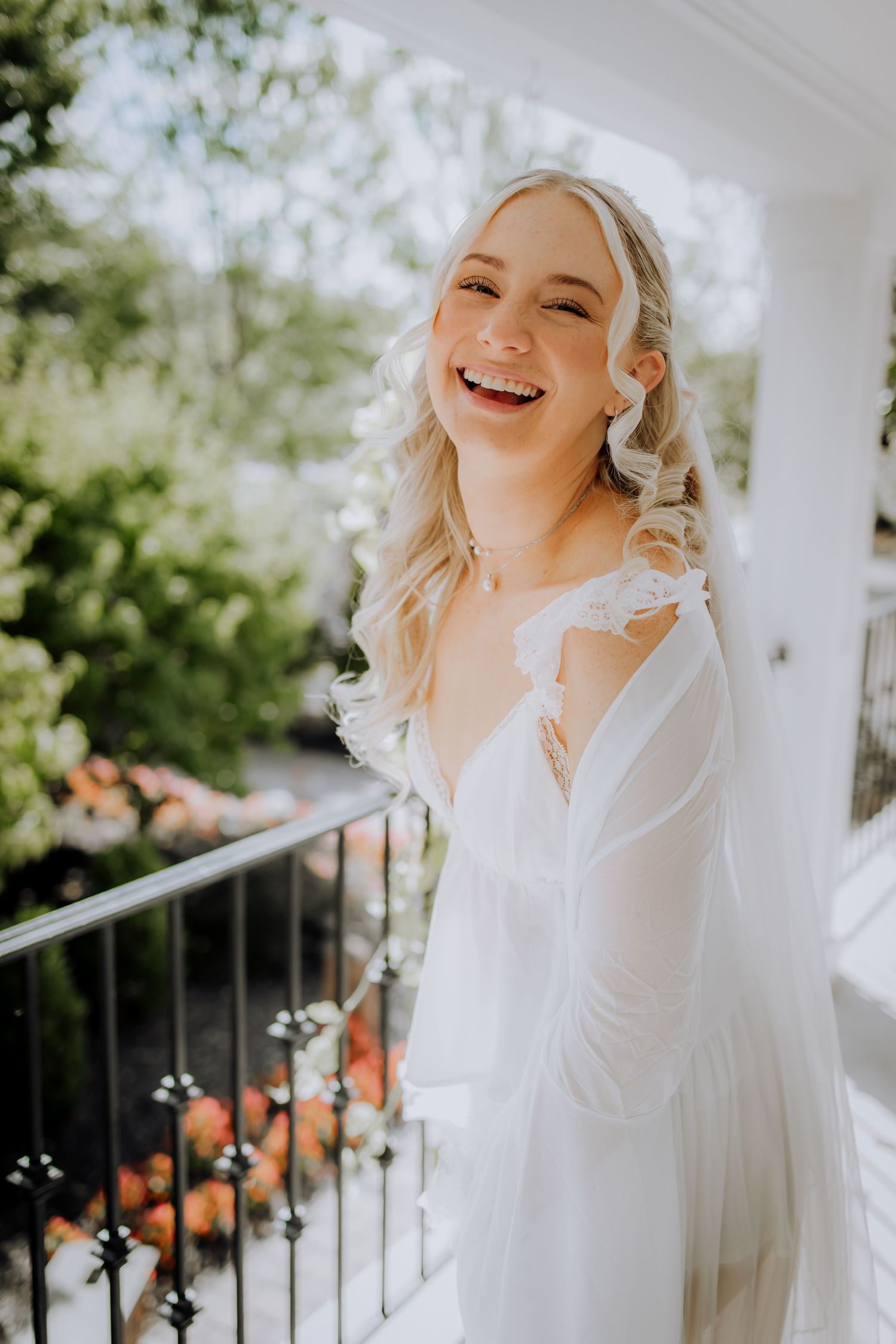 A series of joyful moments captured on a bright sunny porch with white railings and natural light.