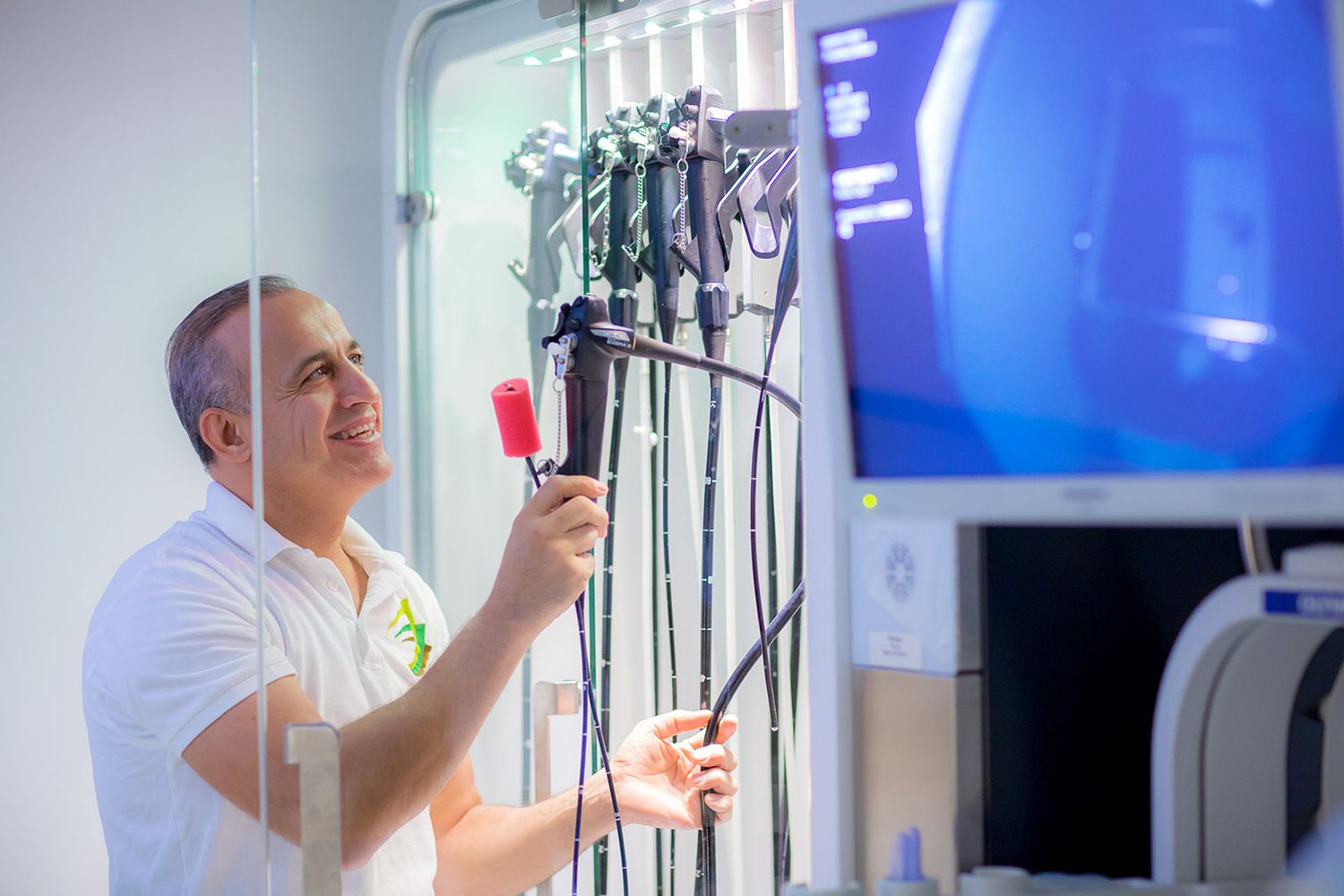 Modern operating room with blue lighting and advanced medical equipment on display.