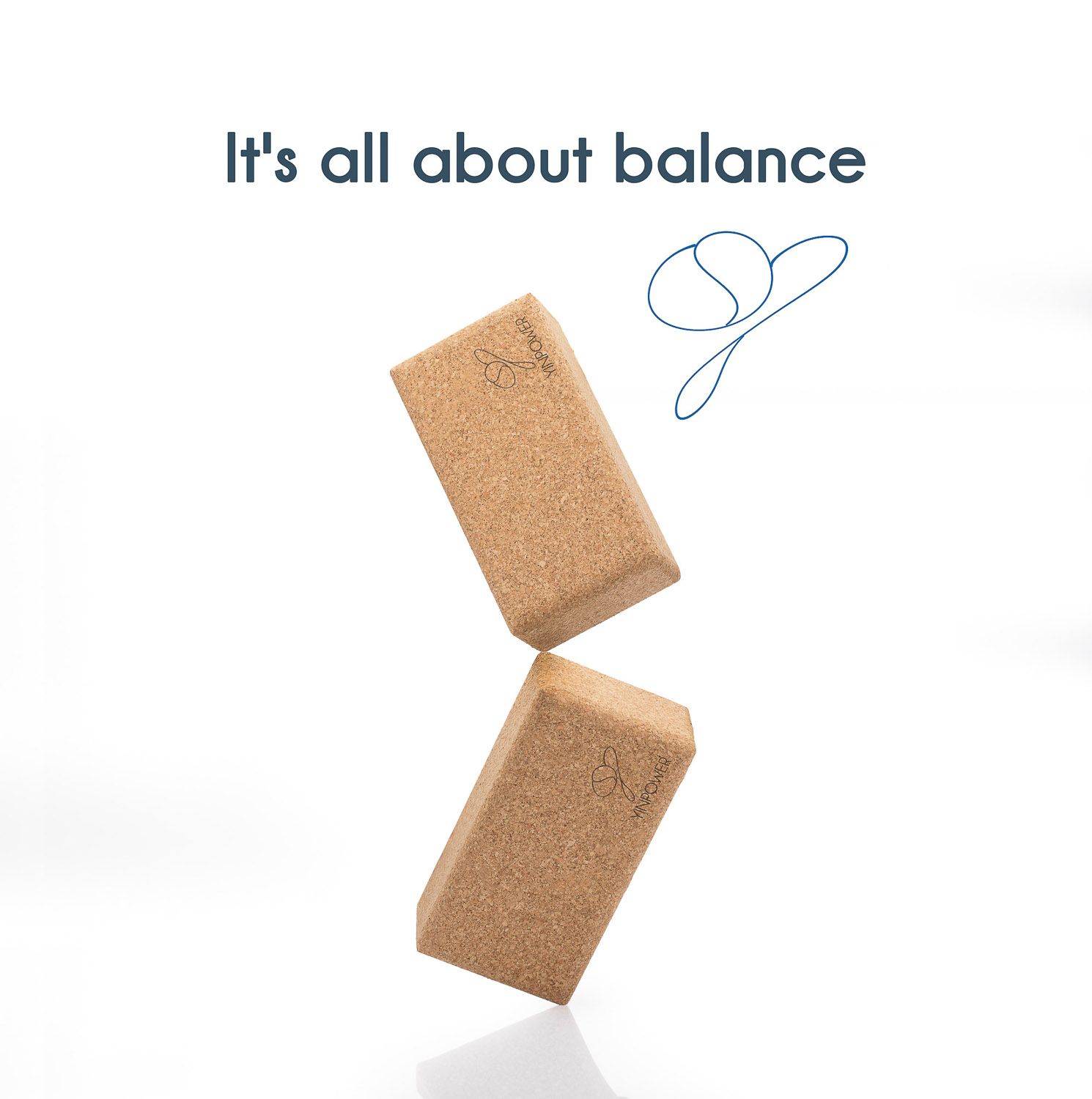 Text reading 'It's all about balance' with cork blocks floating against white background.