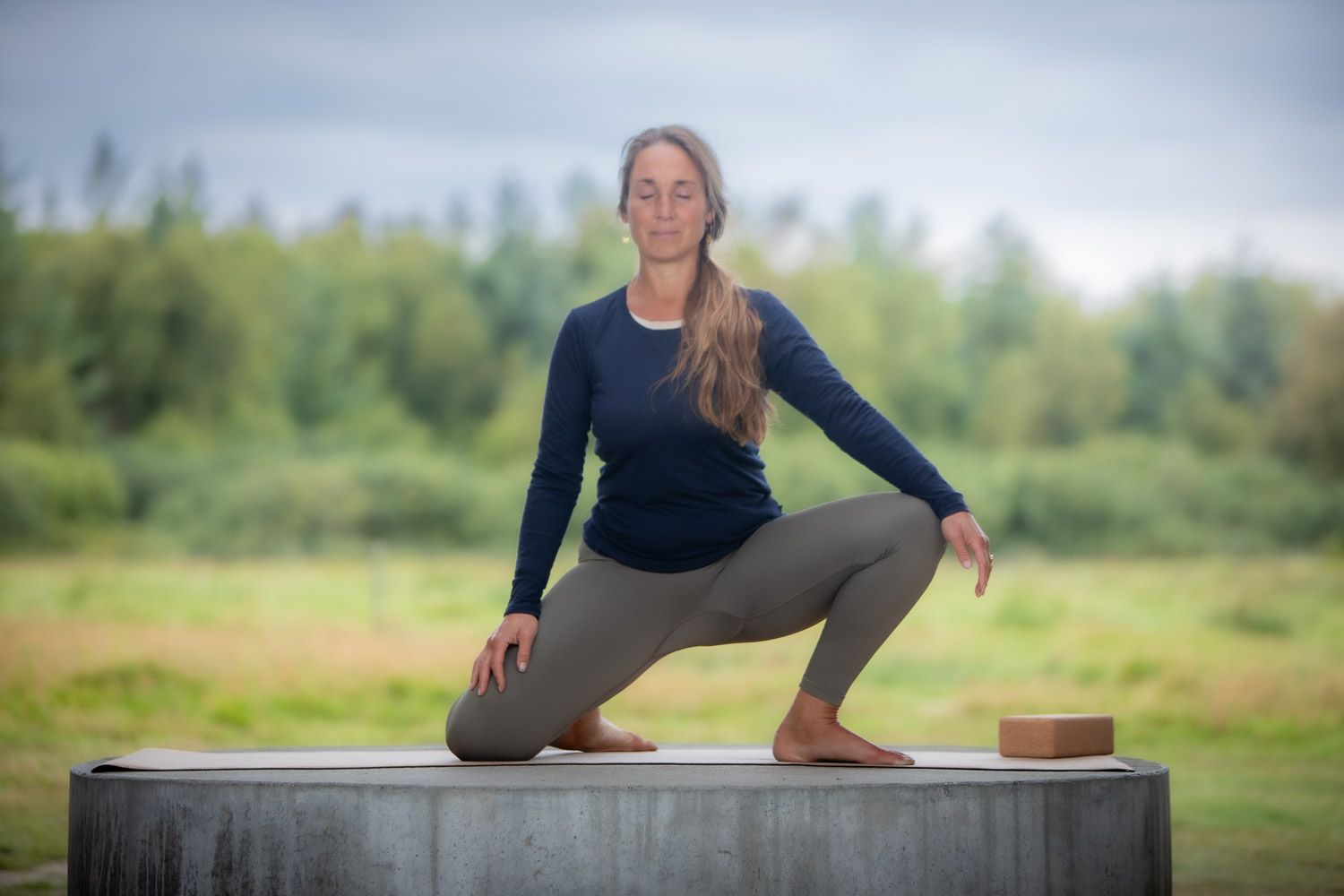 Person showing different yoga positions and stretches in an outdoor setting.
