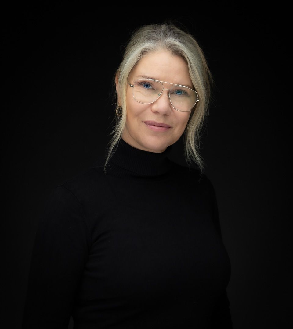 Artistic headshots featuring person in black turtleneck against dark backdrop.