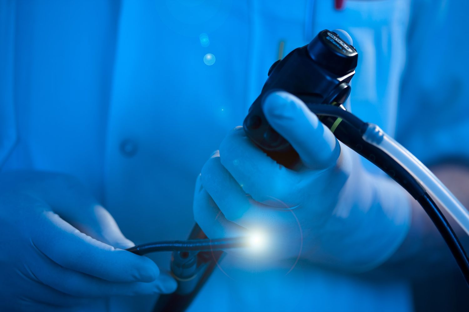 Medical equipment in blue lighting creating a technological atmosphere.