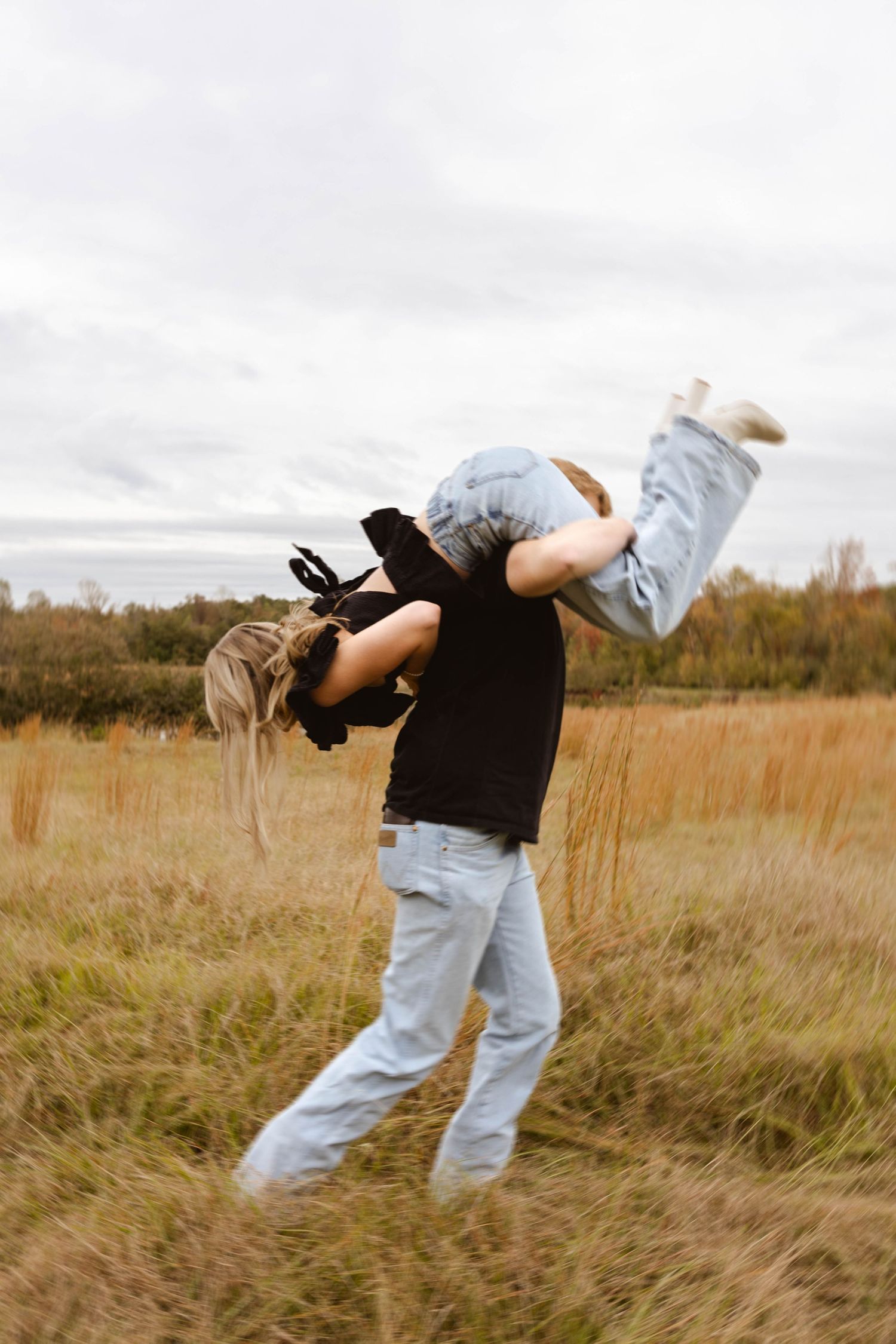 Playful dip pose sequence in tall grass field during golden hour.