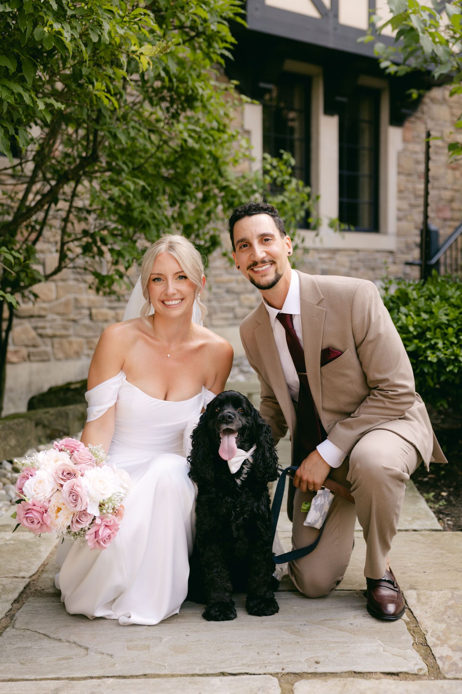 Wedding photo sequence showing newlyweds sitting with their black dog against stone architecture.