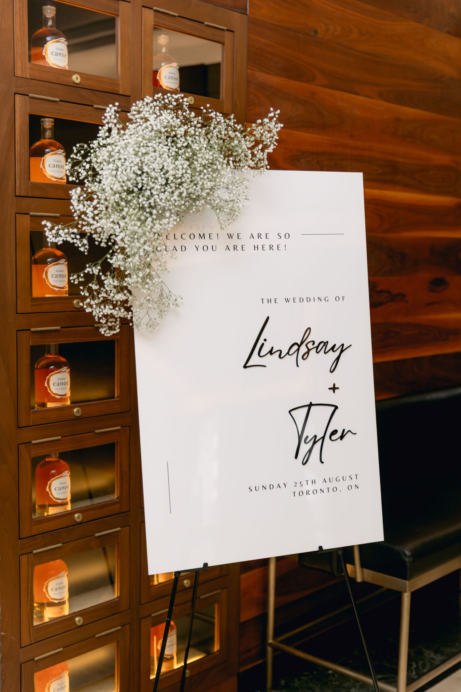 Elegant wedding welcome sign for Lindsay and Tyler, Sunday 25th August, Toronto, adorned with baby's breath flowers.
