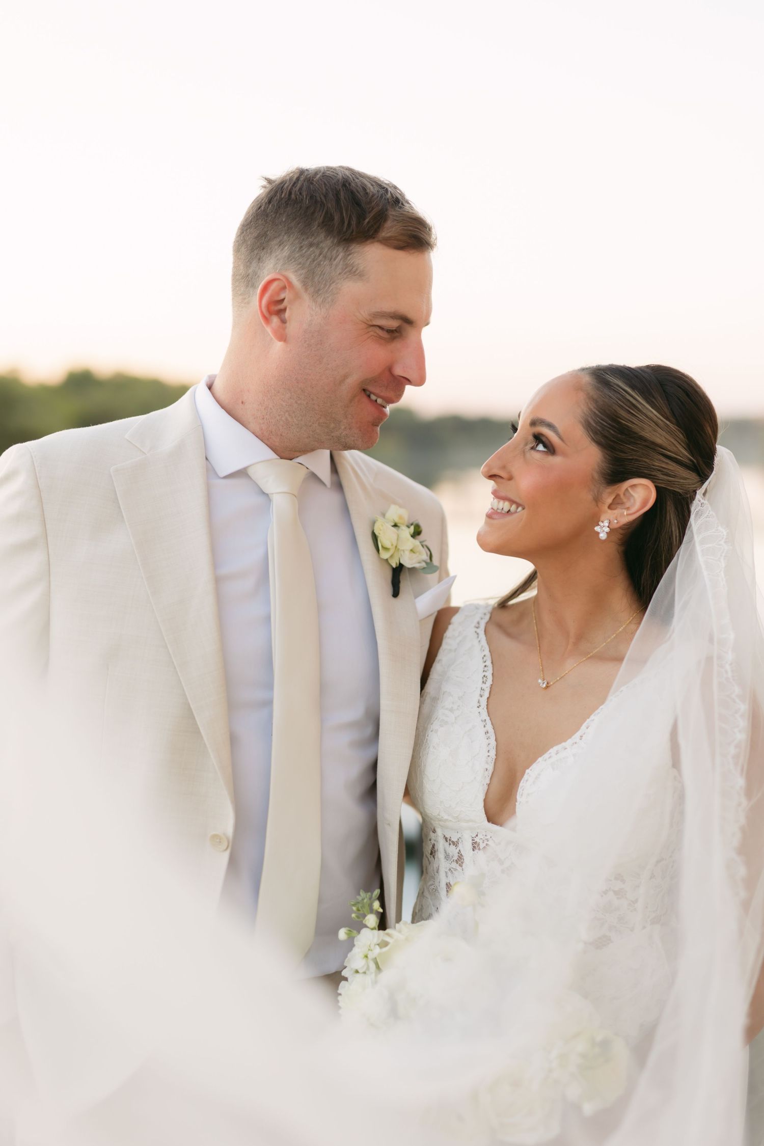 Intimate wedding portraits captured in soft natural light.