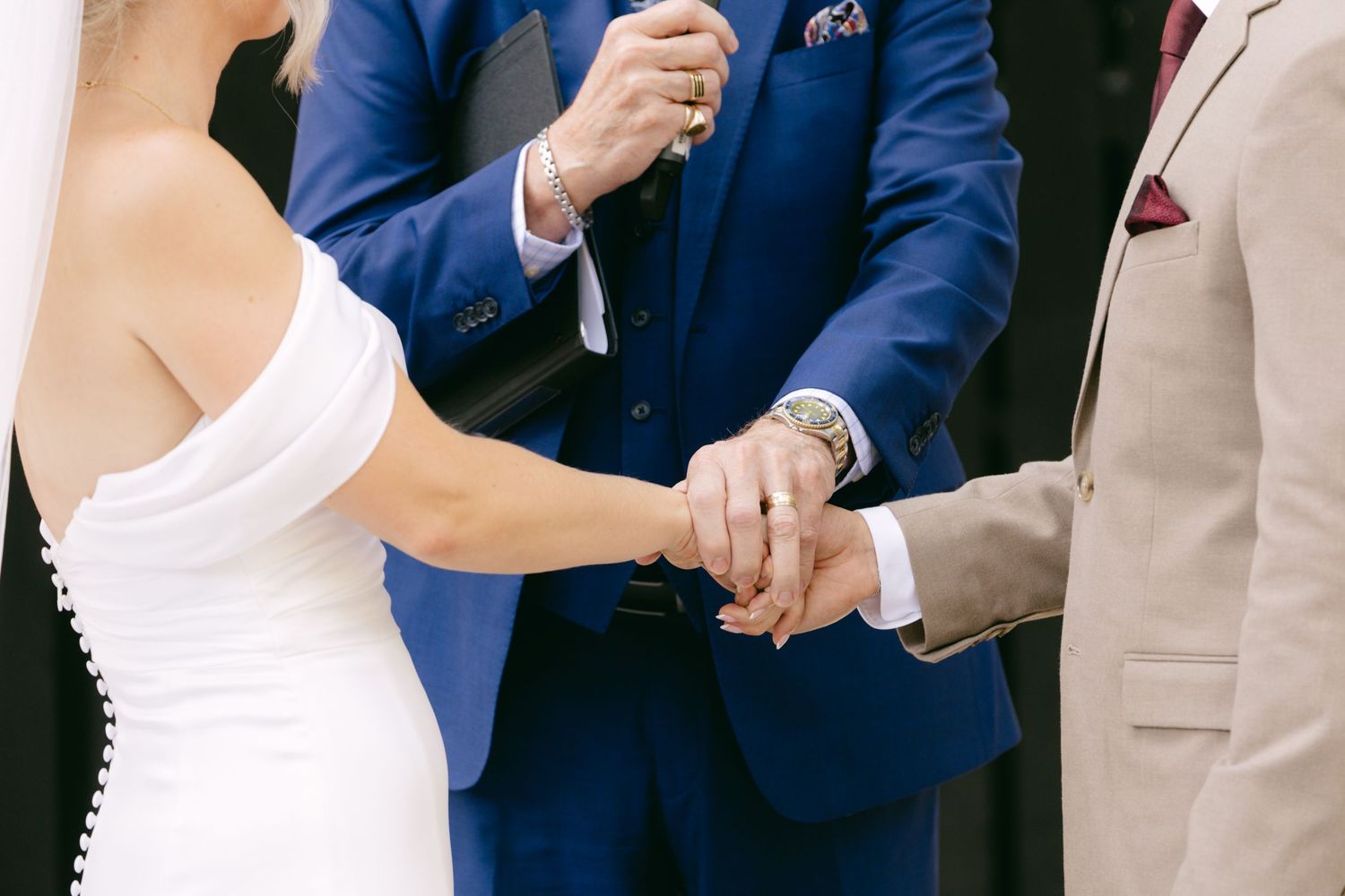 Wedding ceremony moments captured in a series of emotional exchanges.