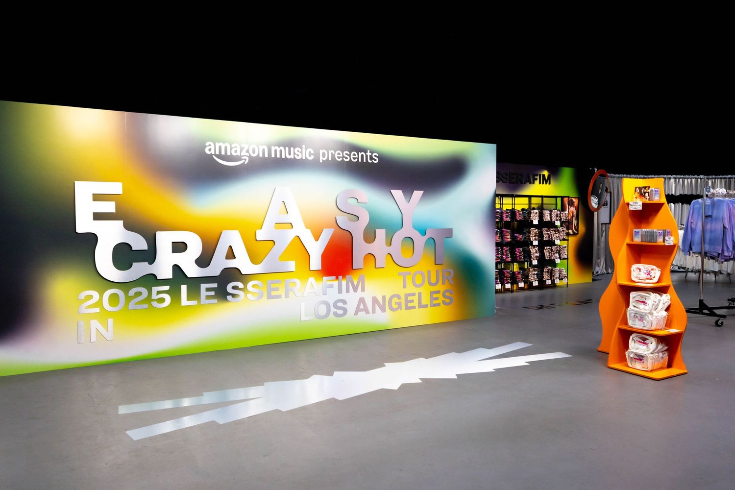 Colorful neon signs and illuminated displays create a vibrant nighttime urban scene with glowing text and graphics.