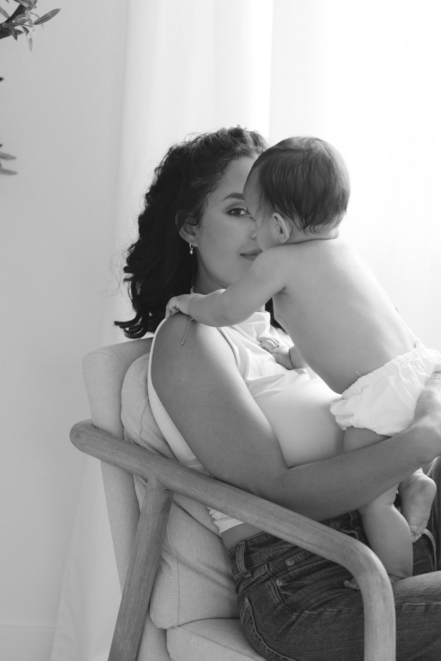 Artistic black and white photo sequence showing intimate moments between two people.