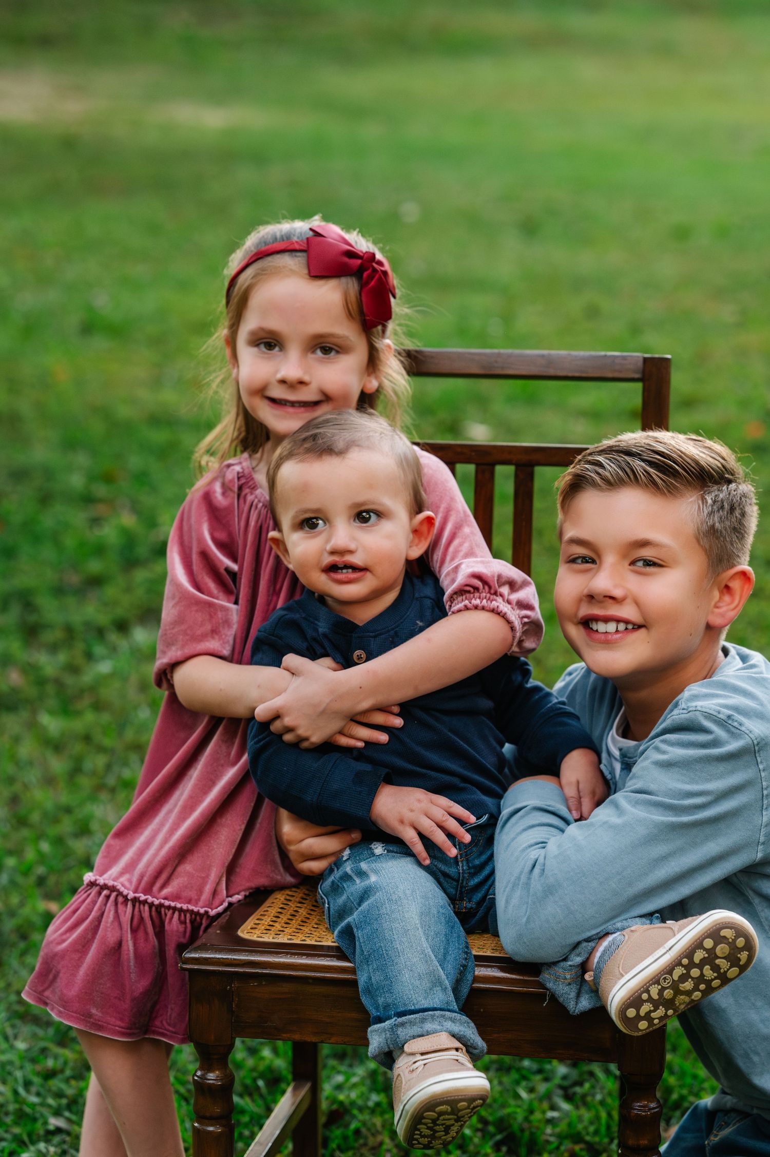Kids playing during a sunset family session. Candid and honest family portraits in Perry, GA by C + F Photography.
