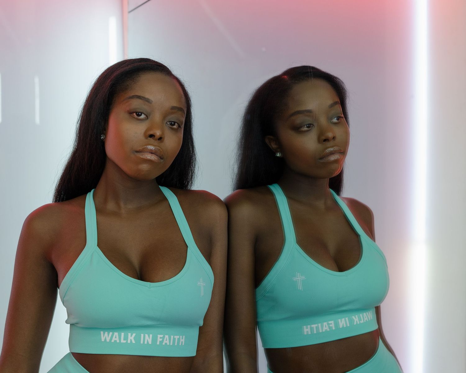 Athletic woman wearing turquoise sports bra shown in multiple poses against white wall.