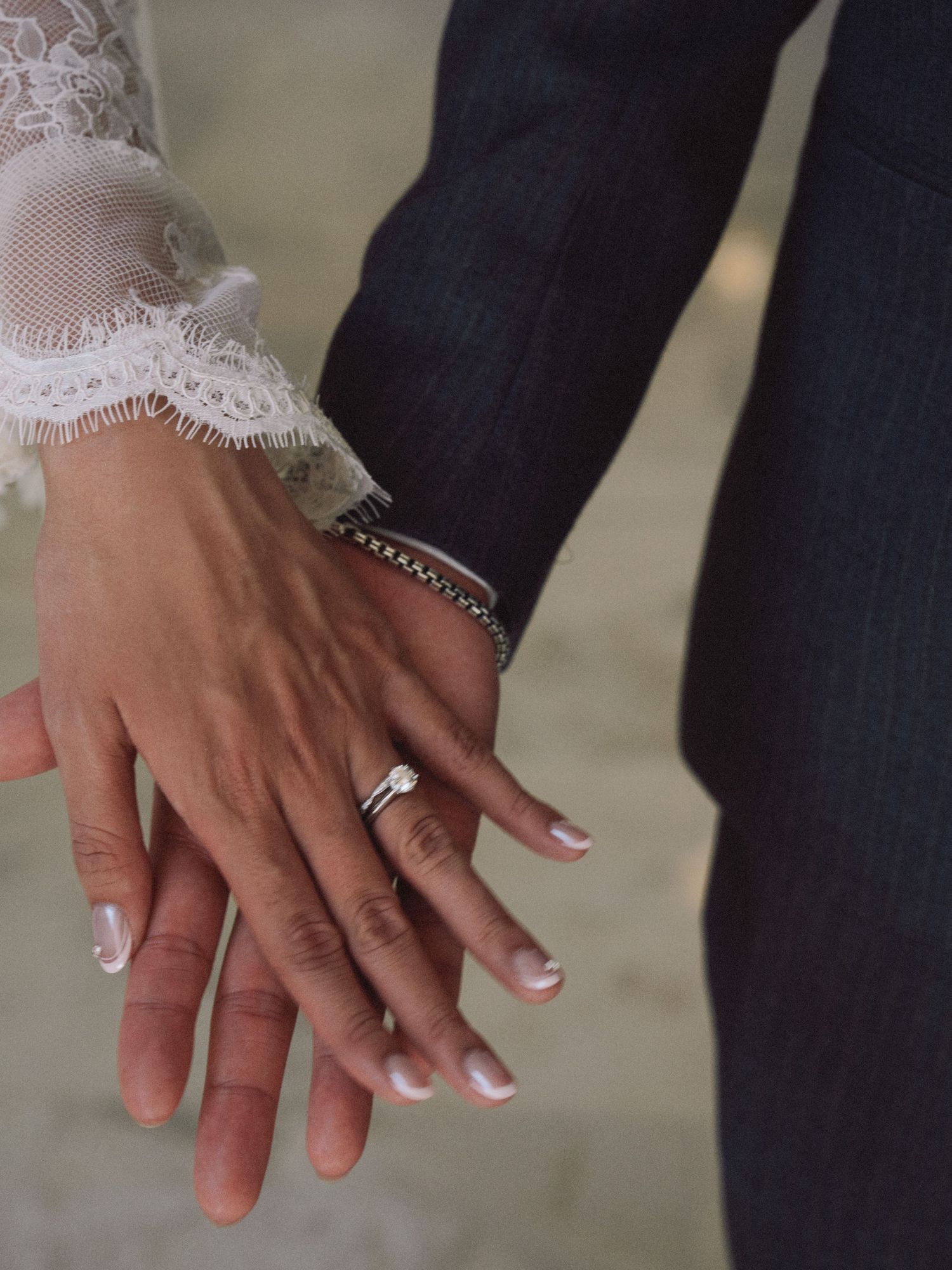 Close-up of wedding rings and hands in a soft, film-inspired style; San Francisco Bay Area; Mandarin, Cantonese, English.