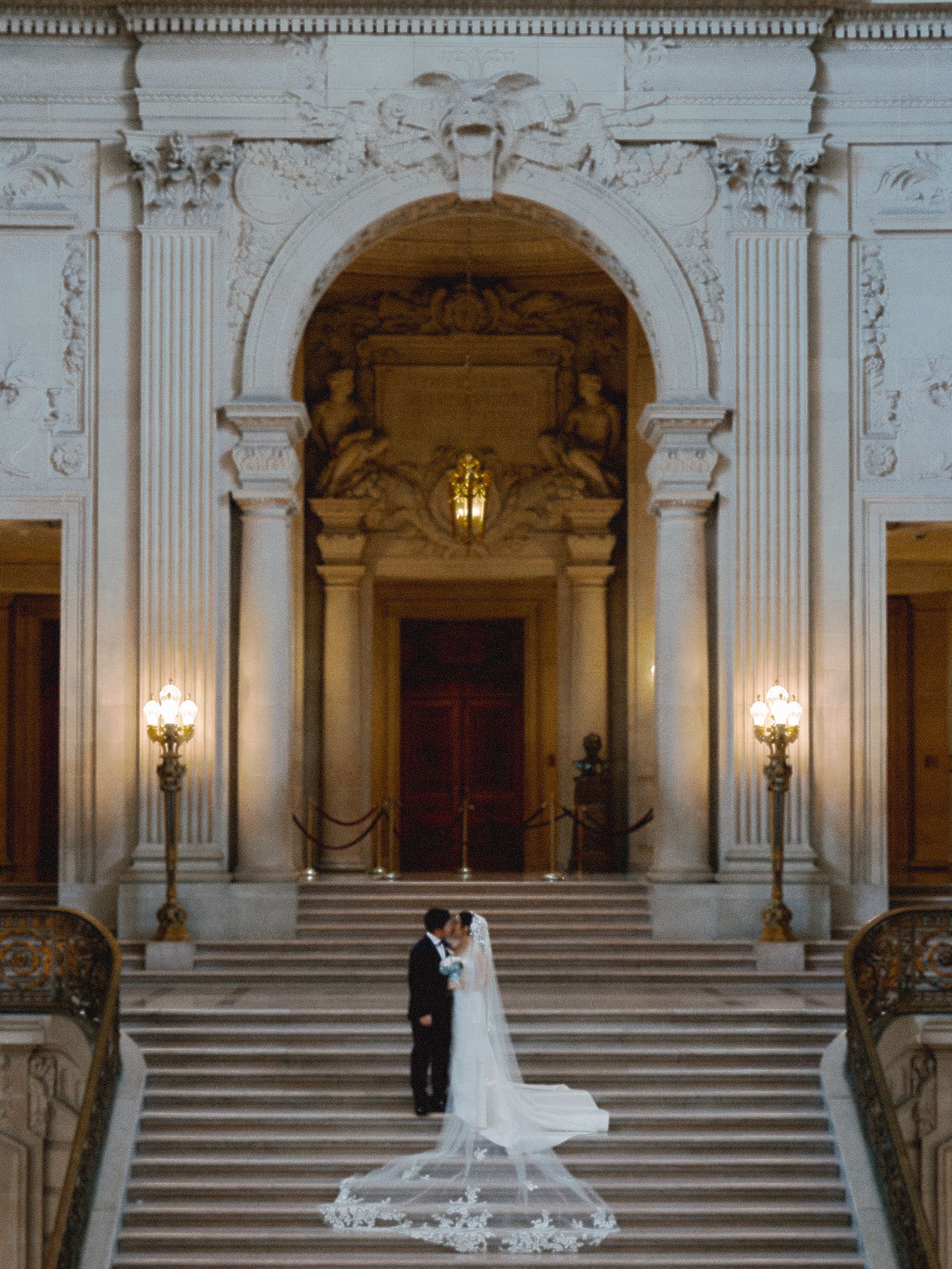 Asian couple at San Francisco City Hall in a film-inspired style; San Francisco Bay Area; Mandarin, Cantonese, English.