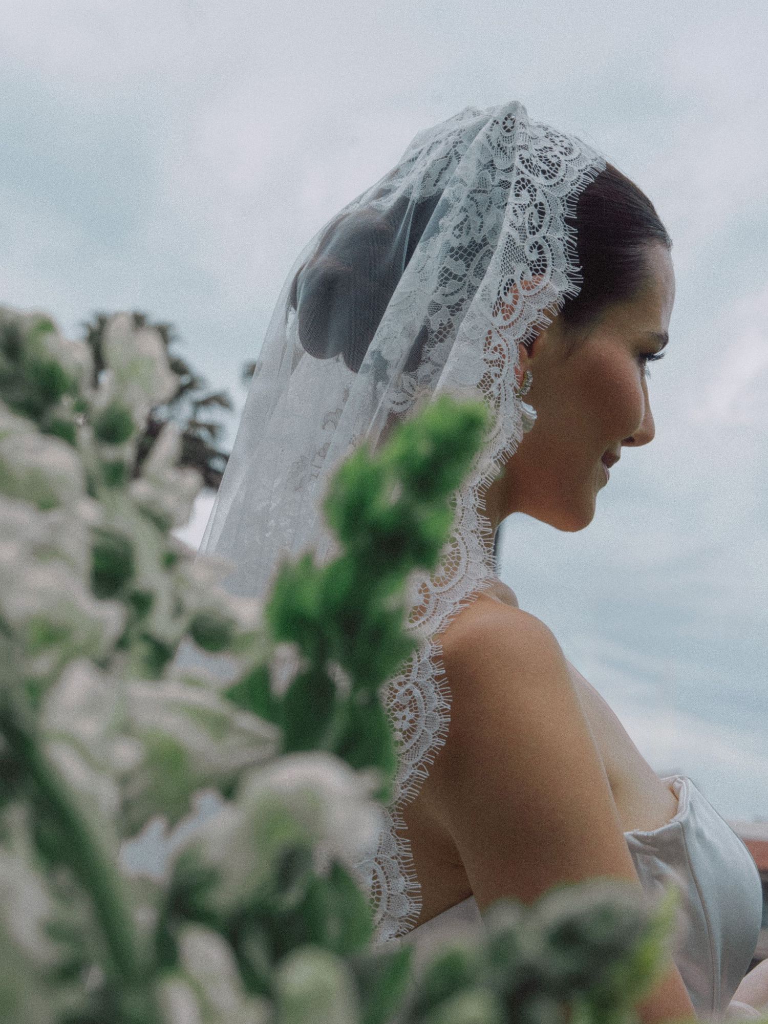Eastern European Bride with lace veil in Santa Barbra in a film-inspired style; San Francisco Bay Area; Mandarin, Cantonese, English.