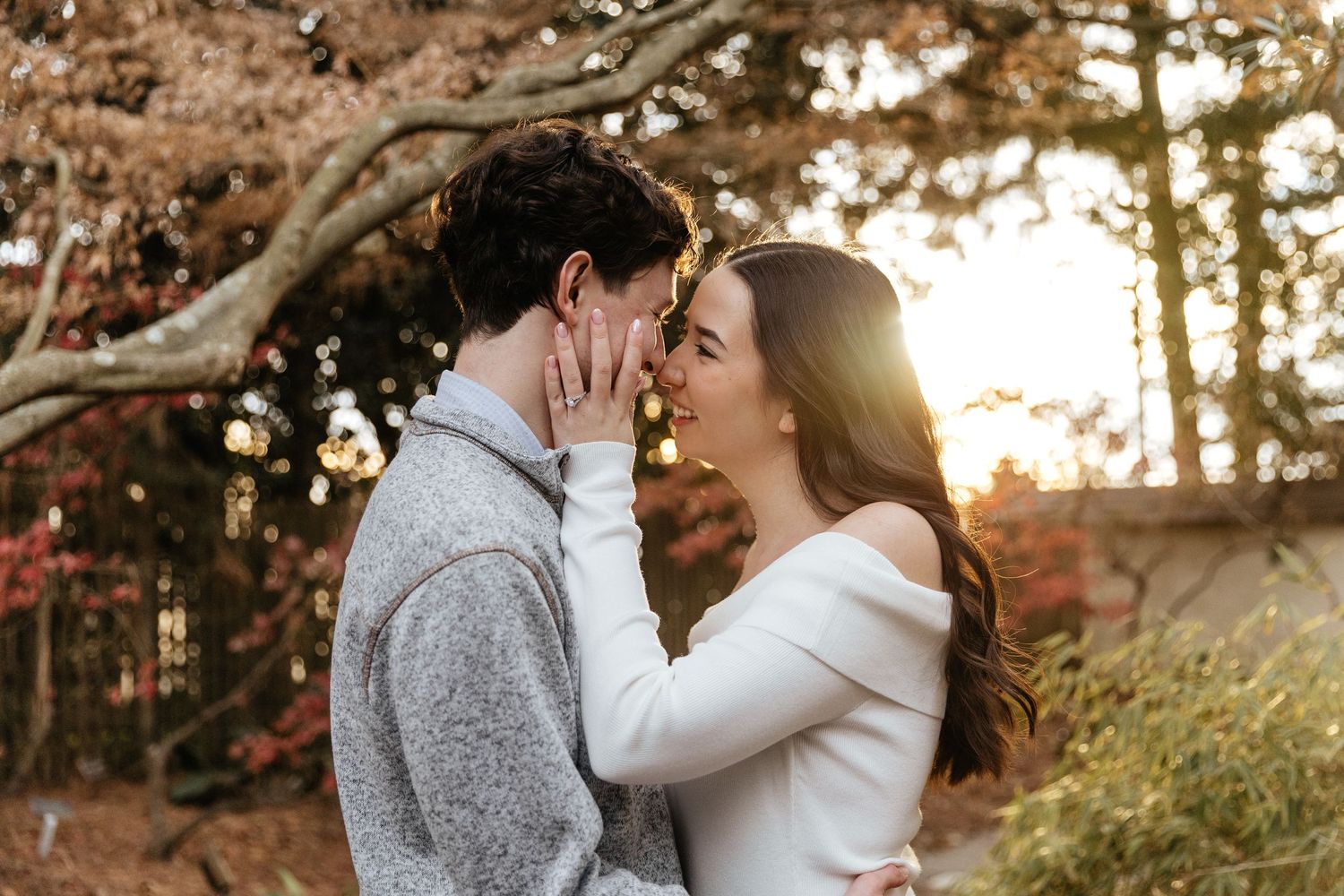 Romantic autumn photoshoot in a sunlit trees.