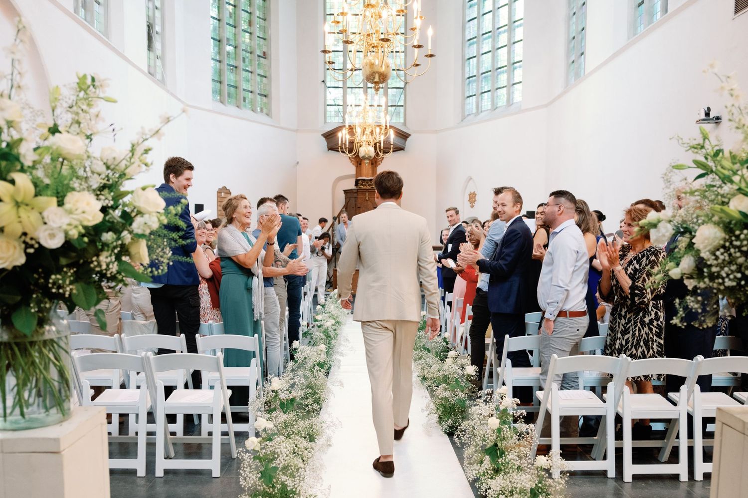 A collage of elegant church wedding ceremony photos showing floral decor, white chairs and guests in attendance.