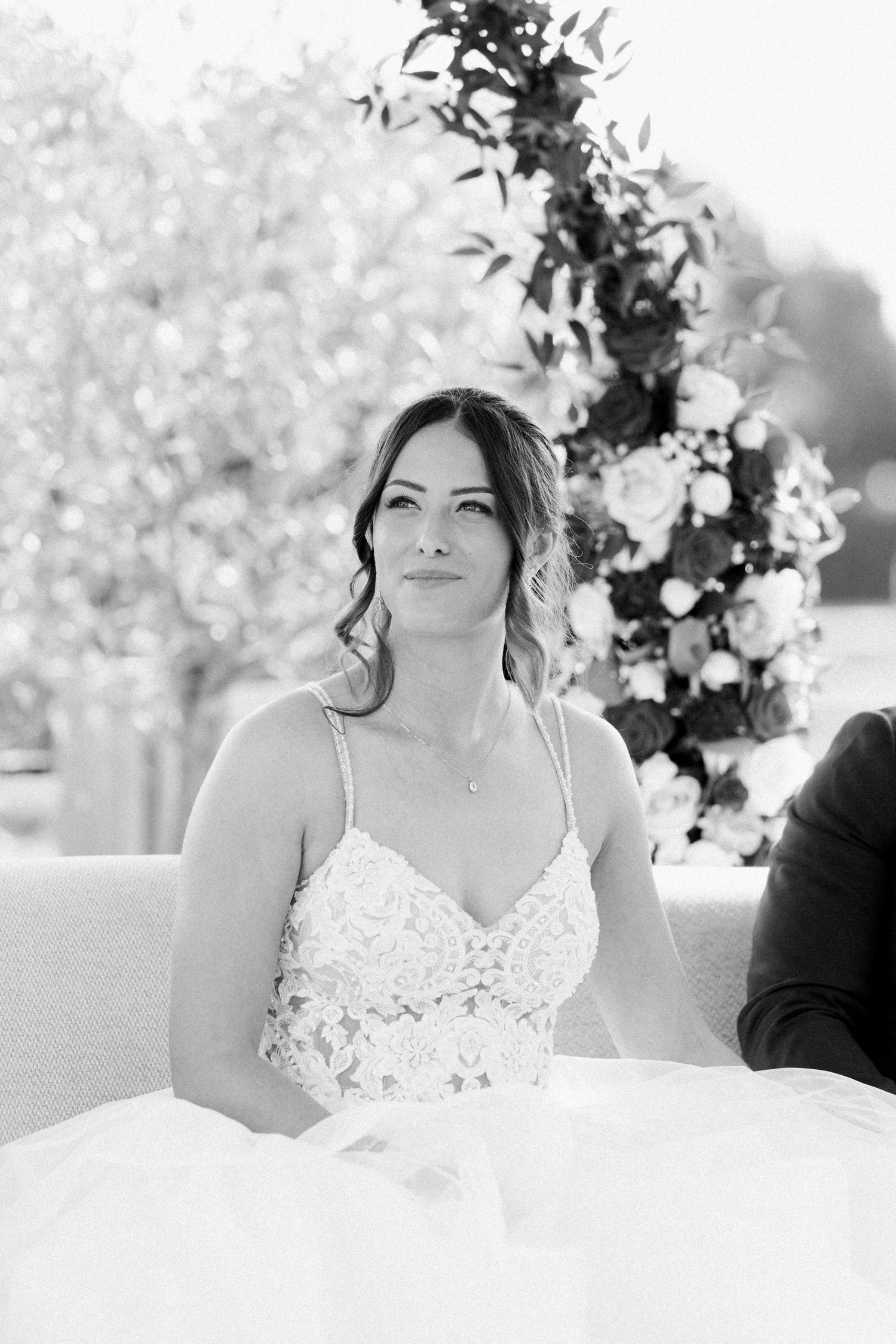 Close-up portrait shots of a bride in a white lace dress against a soft blurred background.
