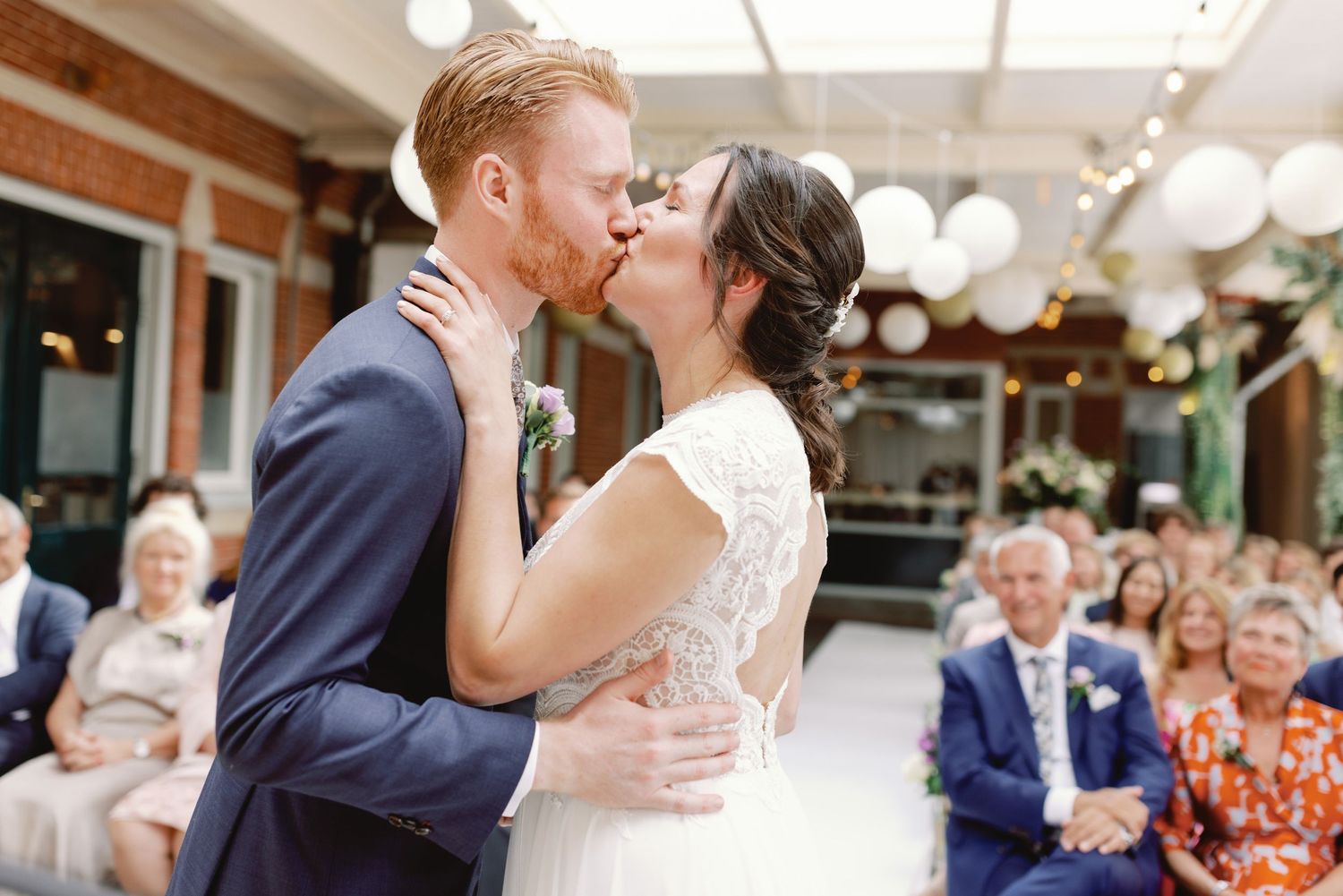 A romantic wedding dance moment captured in a sequence of photos showing a couple embracing on the dance floor.