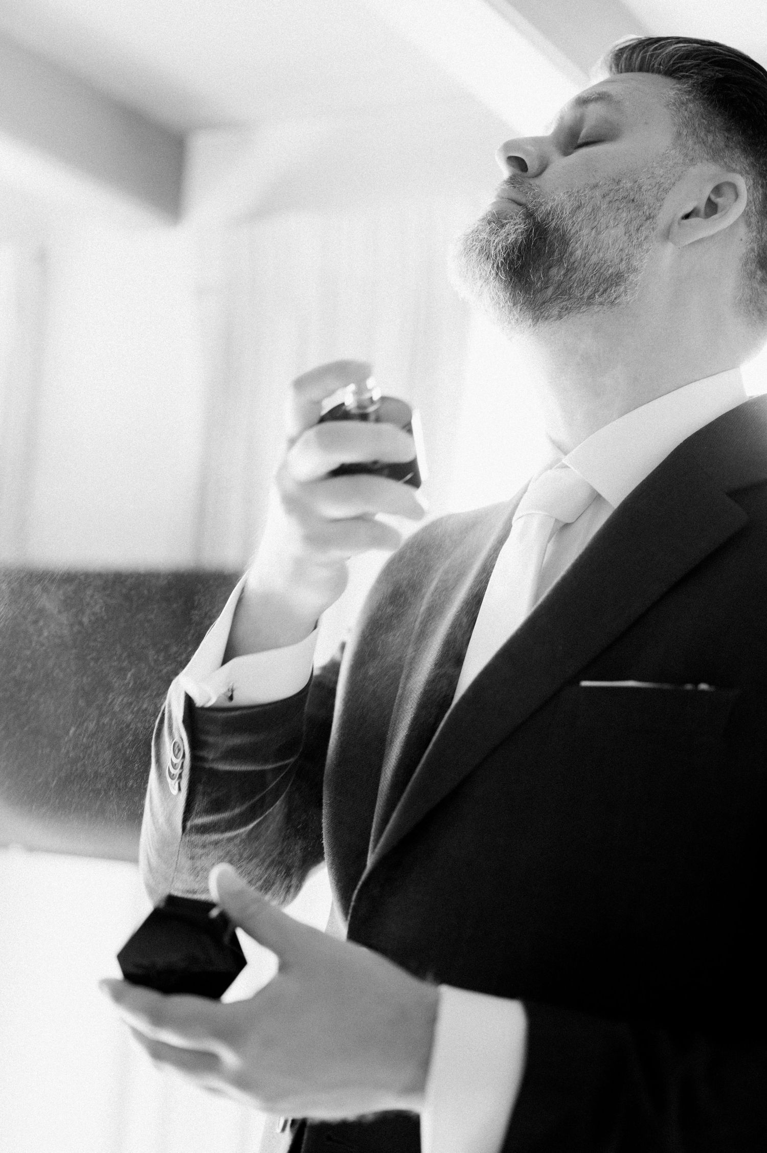 Black and white close-up image of a person drinking from a glass in a series of sequential shots.